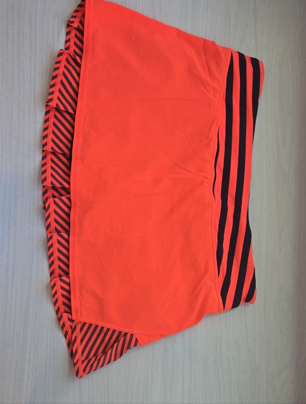 lululemon Athletica Neon Orange Skort with Navy Stripes